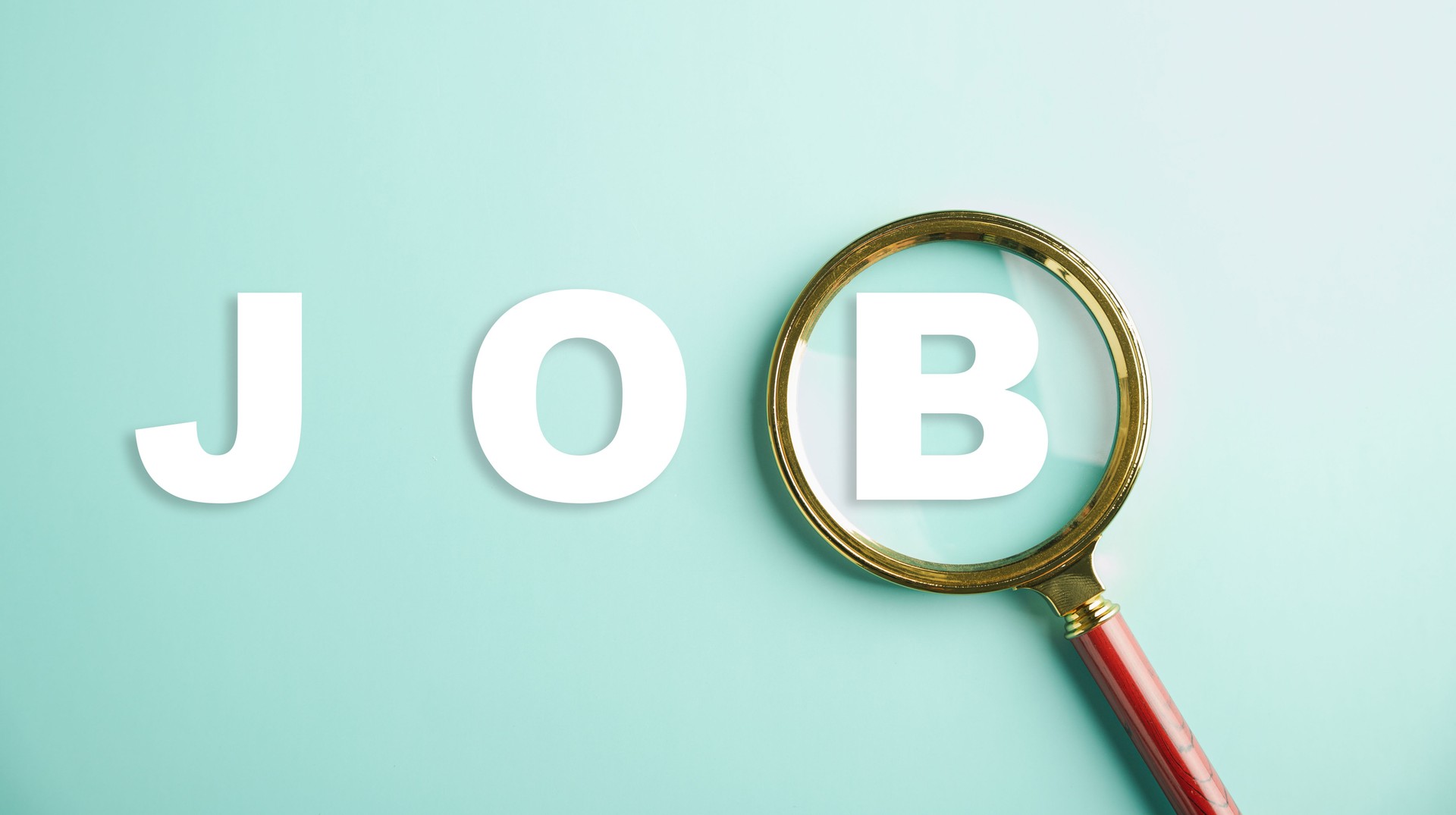 A magnifying glass focused on JOB text